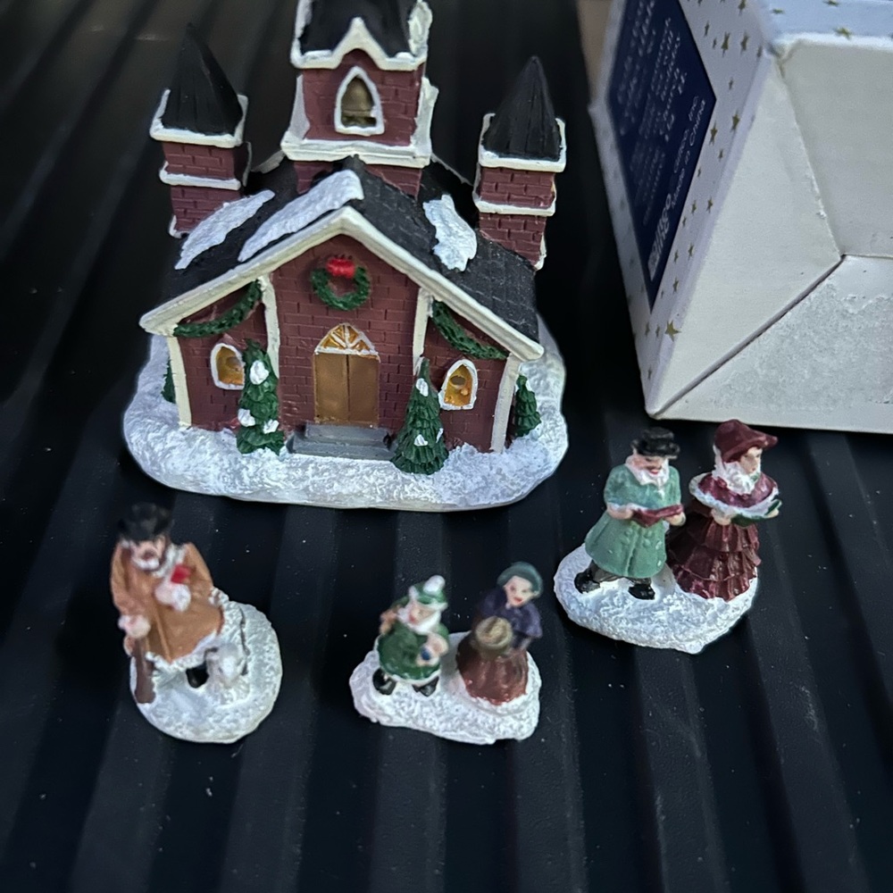 Festive Holiday Village Scene with Figurines